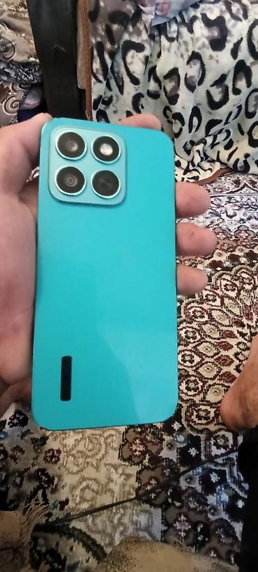 kamera digital: Satılır: yaşıl rəngli smartfon Xüsusiyyətlər: - Korpus: düz kənarlı — 5