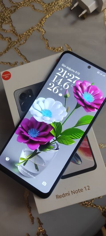 телефон fly ds169: Xiaomi Redmi 12, 128 ГБ, цвет - Голубой, 
 Сенсорный, Отпечаток пальца, Две SIM карты