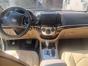 kreditle avtomobil: Hyundai Santa Fe: 2.4 л | 2012 г. Внедорожник — 7