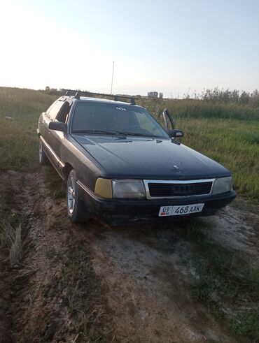 обмен на дом в городе каракол: Седан Audi 100 черного цвета, оборудованный багажником на крыше