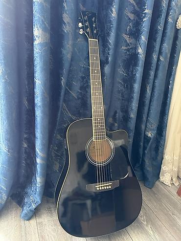 Akkustik gitara – qara rəng, dreadnought korpus, kəsik (cutaway) lalafo.az -da Akkustik gitara – qara rəng, dreadnought korpus, kəsik (cutaway)
