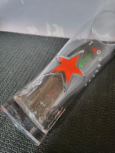 Čaše: Case nove za pivo Heineken. Case nove,sve na njima odsjaj od svetla — 15