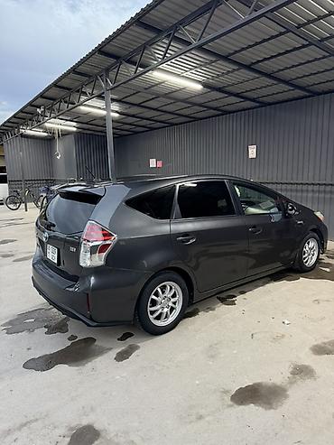 королла 1 6: Toyota Prius V: 2016 г., 1.8 л, Автомат, Гибрид, Универсал — 3