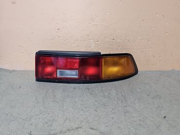 Передние фары: Задний правый стоп-сигнал Mazda 1992 г., Б/у, Оригинал, Германия