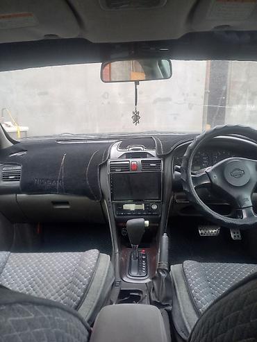 авто в такси: Nissan Primera: 2000 г., Автомат, Седан — 6