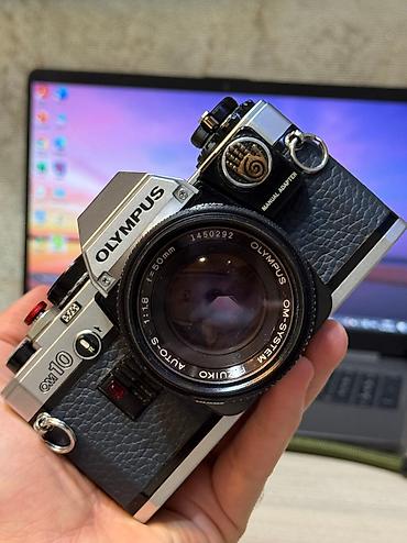 Fotokameralar: Olympus Om-10 Məlumatlar: 1979-cu il istehsal və səliqəli saxlanılıb — 2