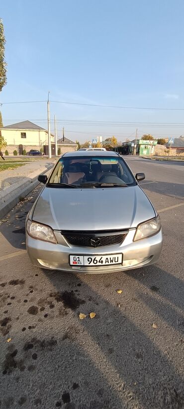 часы в авто: Mazda Protege: 2001 г., 1.5 л, Автомат, Бензин, Седан