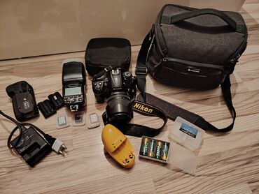 şirin su aparati: Nikon D7000 rəqəmsal güzgülü fotoaparatı geniş çeşidli obyektivlərlə