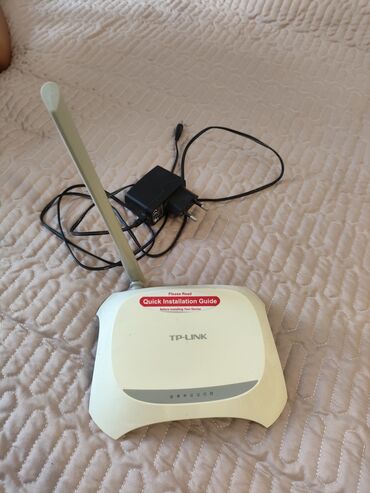 ailetv internet: TP-Link simsiz Wi‑Fi router - Brend/model: TP-Link (üzərində “Quick