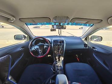 Toyota: Toyota Corolla: 1.6 l | 2007 il Sedan — 8