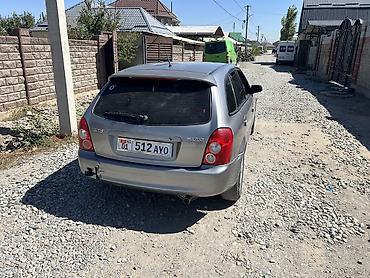 руль левый: Mazda 323: 2002 г., Механика, Бензин, Хэтчбэк — 3