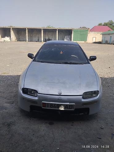 Mazda 323: 1996 г., 1.5 л, Механика, Бензин, Лифтбек — 2