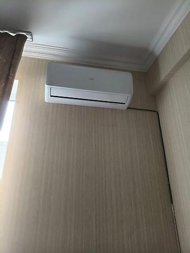 Divar tipli split kondisioner - Rəng: ağ, minimal dizayn - Divar