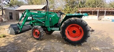 ручной мотоблок: Минни погрузчик трактор - Марка/серия на капоте: Deluxe 3500