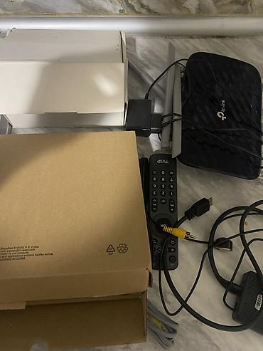 tv box kanallar: TP-Link Wi‑Fi router və IPTV set-top box komplekti Tərkib: - TP-Link — 2