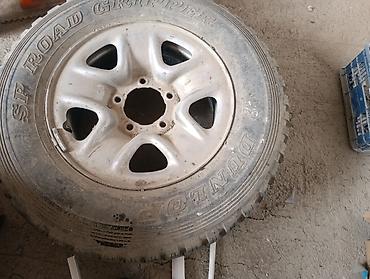 d 110: Колесо в сборе: шина + литой диск. - Шина: Dunlop SP Road Gripper - — 3