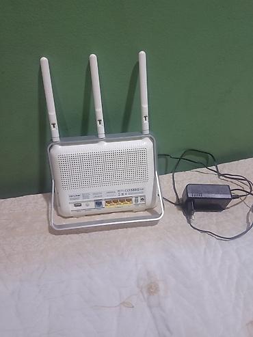 redmi pad 5: TP-LINK Archer C8 modem/router satılır. - 1 ədəd WAN/LAN port - 3 ədəd — 2