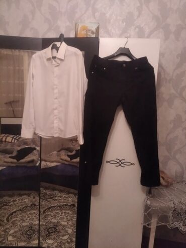 Gencede satilir cins salvar Tomford razmer 32birde ag rubaska ceki 75