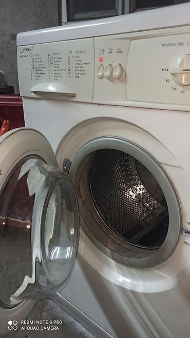 Стиральная машина Indesit, фронтальная загрузка. 1100/600 оборотов, 5