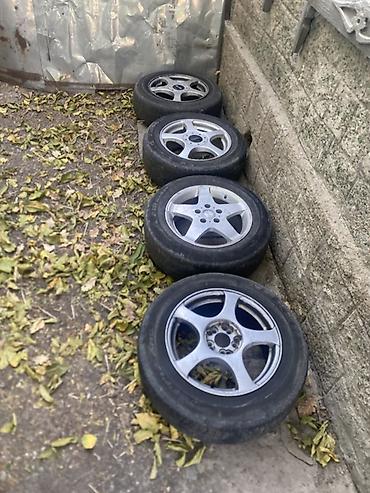 Комплект из 4 автомобильных колес с легкосплавными дисками. - Диаметр