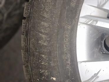 225 35 18: Комплект зимних шин 215/65 R16 на дисках с колпаками Toyota — 2