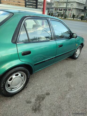 Toyota: Toyota Corolla: 1.3 l. | 1999 έ. Λιμουζίνα — 2