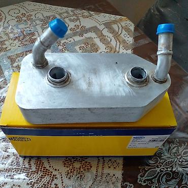 kamaz radiator: Magneti Marelli yağ-soyuducu (oil cooler) - Brend: Magneti Marelli - — 1