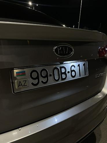 sonata fara: Kia Optima sedan kuzalı avtomobildir. Şəkillərdə avtomobil gümüşü — 5
