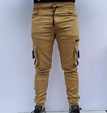 Ostala muška odeća: Muške cargo pantalone – bež/karamel boja - Kroj: slim/skinny nogavice — 4