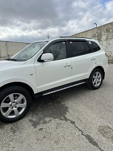 kia rio sukan: Hyundai Santa Fe: 2 l | 2009 il Krossover — 3