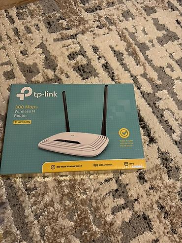 modem satilir: TP-Link TL-WR841N – 300 Mbps Wireless N router - Sürət: 2.4 GHz — 1