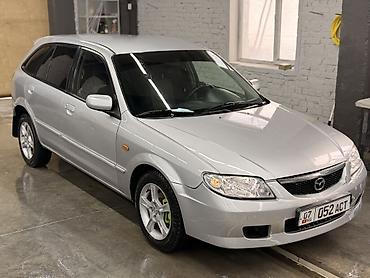 Mazda: Mazda 323: 2003 г., 1.6 л, Механика, Бензин, Универсал — 6
