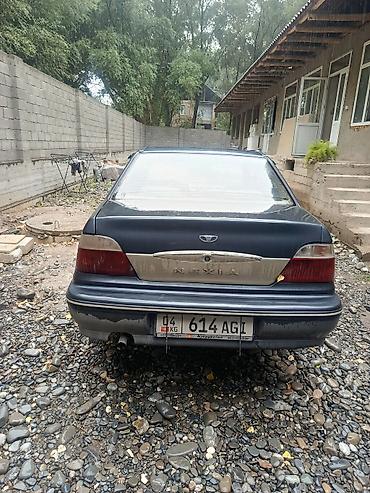 салон машины: Daewoo Nexia: 2003 г., Бензин, Седан — 2