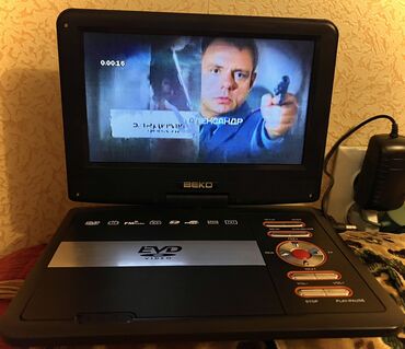 ломбард телевизоры: Продам фирменный DVD LG dp561 новый в коробке с зарядкой в сеть с