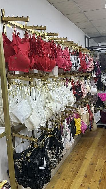 кио к5: Продам торговую стойку для нижнего белья. Стильная золотистая — 1