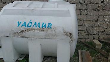 yağmur: Yağmur markalı plastik su çəni - Həcm: 3000 litr (çənin üzərində qeyd — 1