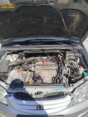 подстаканник хонда одиссей: Honda Odyssey: 2000 г., 2.3 л, Автомат, Газ, Минивэн — 10