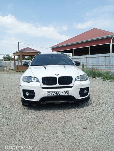 турбо аз азербайджан продажа авто: Ağ rəngli BMW X6 SUV modeli. Fərqli xarici görünüşü və idman