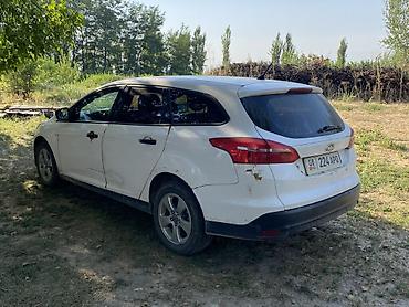 Продажа авто: Ford Focus: 2015 г., 1.6 л, Механика, Бензин, Универсал — 2