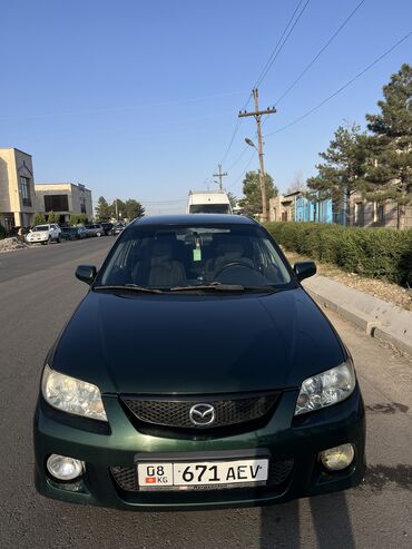 шины r15c: Mazda 323: 2002 г., 2 л, Механика, Бензин, Хетчбек