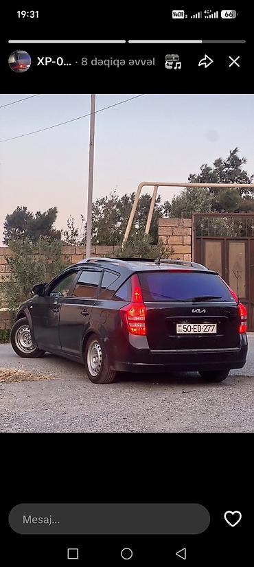 üstü açıq maşın: Kia Cee’d SW (universal) – qara rəng, Azərbaycan nömrə nişanı — 3