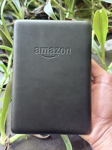 Электронные книги: Amazon Kindle Paperwhite 10-е поколение (8GB / IPX8) - Экран E‑Ink 6" — 4