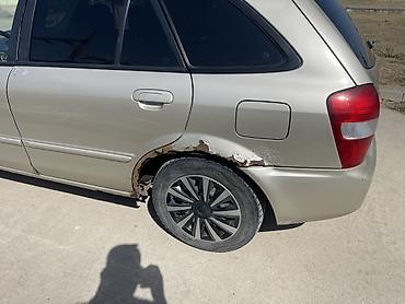 ротационная борона: Mazda 323: 2001 г., 1.6 л, Механика, Бензин, Универсал — 5