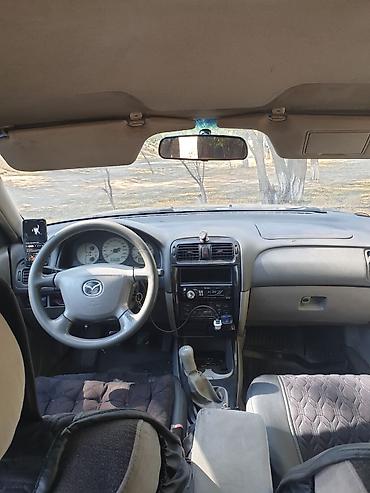 аудио касета: Mazda Capella: 2002 г., 2 л, Механика, Универсал — 5