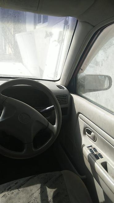 Продажа авто: Mazda Demio: 1999 г., 1.5 л, Механика, Бензин, Хэтчбэк — 3