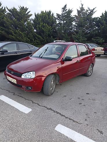 4 qapi niva: LADA Kalina sedan – qırmızı rəng hec bir xerc təlb etmir otur sur — 2