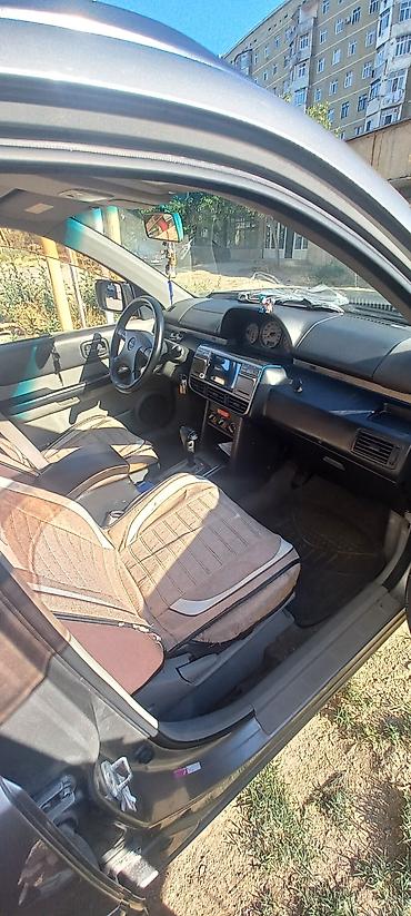 forut satsi: Nissan X-Trail: 2 l | 2002 il Krossover — 5