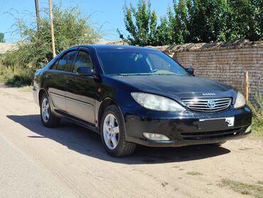 купить багажник на крышу авто в бишкеке: Toyota Camry (XV35), черный седан. Основные особенности: - Кузов