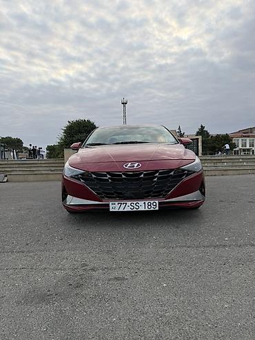 yan guzgulər s: Hyundai Elantra Limited – qırmızı sedan Texniki və dizayn: - Korpus — 2
