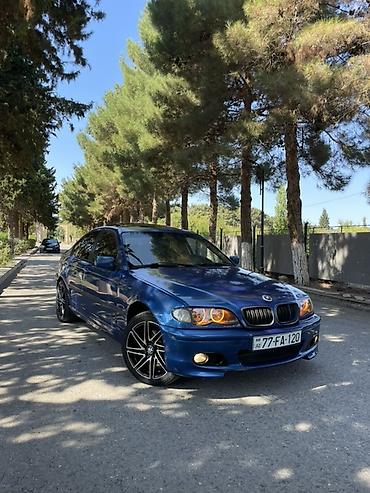 toyota corolla cross: BMW 3 series: 2.5 l | 1999 il Sedan — 5